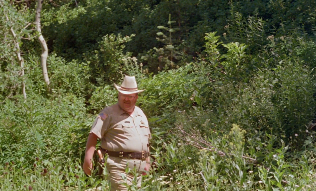 Imagen de un policía de Don't go in the woods.